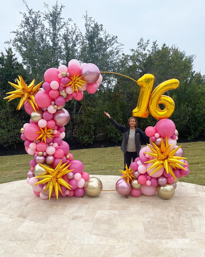 Giant metal arch stand w/ spiky balloons and age