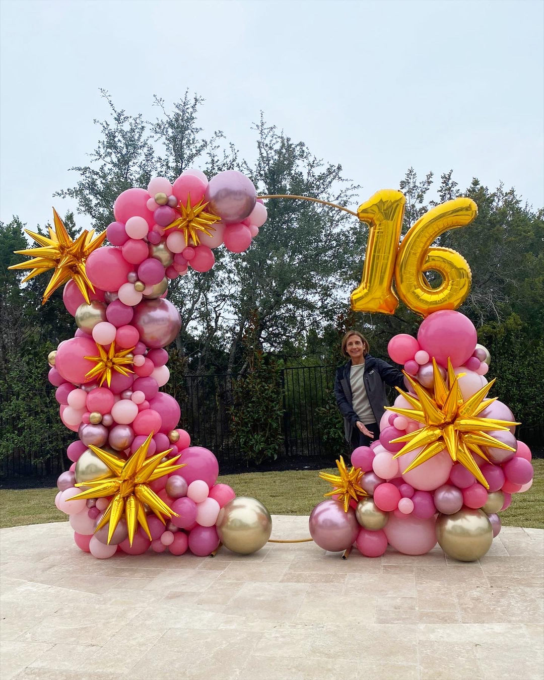 Giant metal arch stand w/ spiky balloons and age