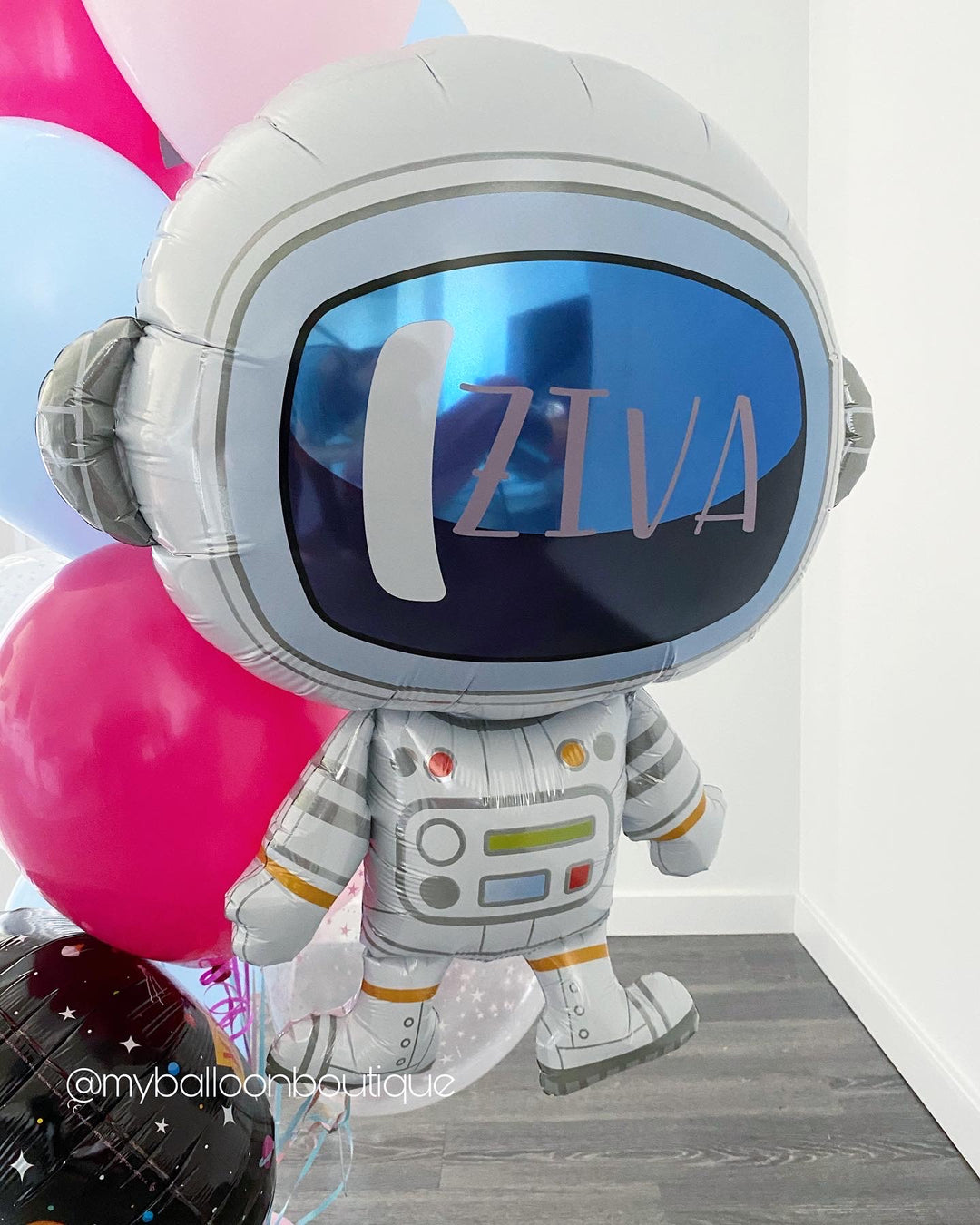 Astronaut balloon, customized with a name across the spacesuit visor