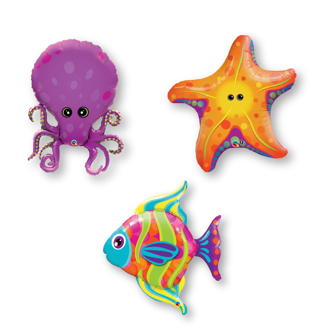 Three mylar sea creature balloons, including an octopus, a star fish, and a sea fish