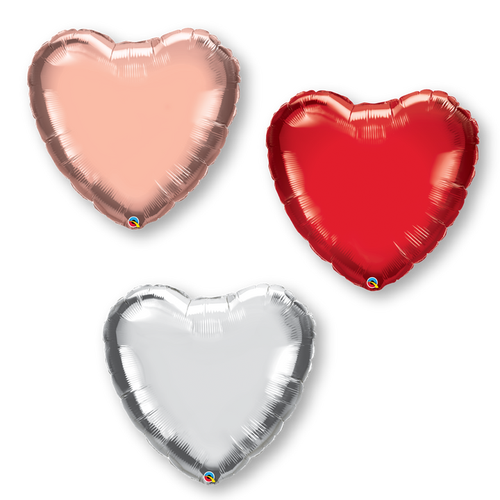 Assortment of jumbo sized pink, red and silver mylar foil balloons