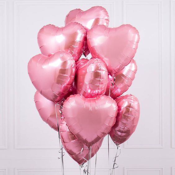 Large bouquet of pearl pink mylar foil heart balloons